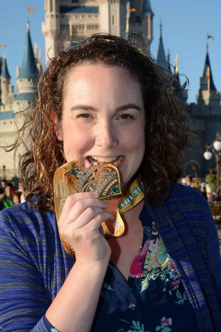 runDisney Princess Half-Marathon Medal in front of the Castle