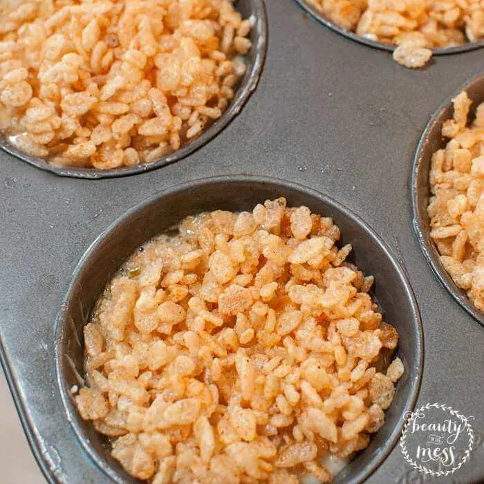 Spoon rice cereal into muffin tins over egg mixture
