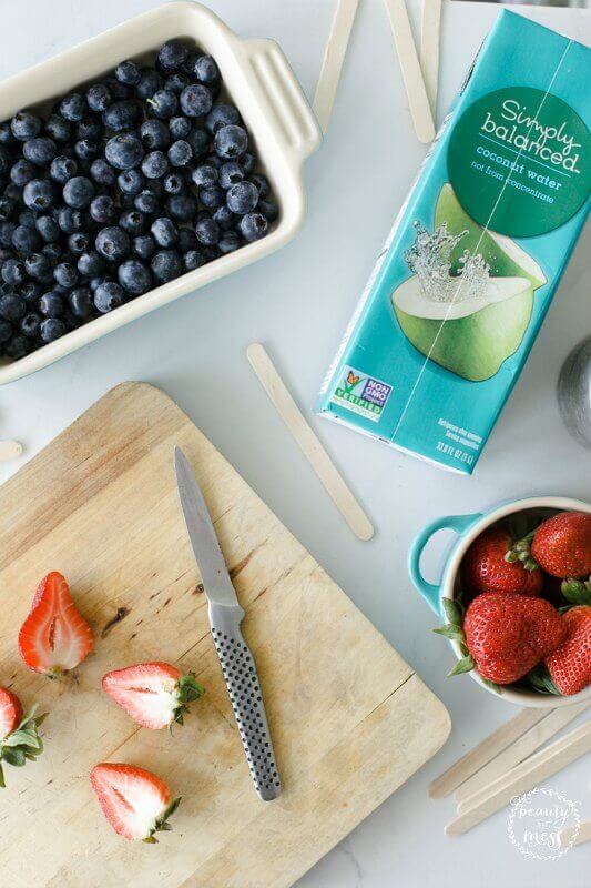 blueberries, strawberries, cutting board