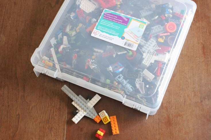 best toy storage for small spaces - LEGO bricks shown being stored in a clear bin