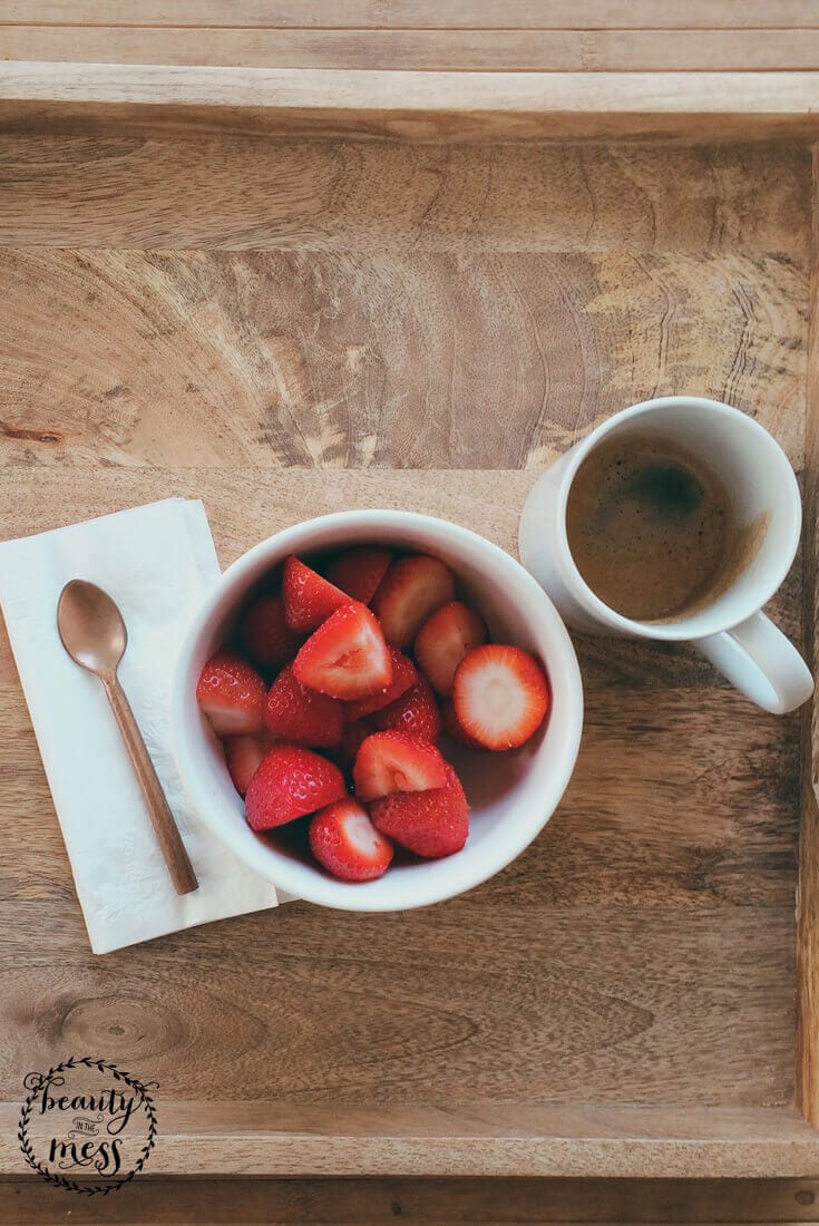 How to Plan a Memory-Filled Staycation strawberries in a bowl with a coffee cup