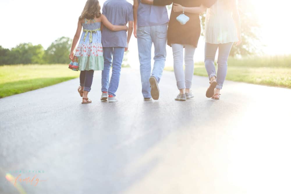 family walking together - ways to give back during the Holidays.